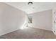 Neutral bedroom featuring a large window letting in natural light and plush carpeting throughout at 527 Bohannon Rd # 12, Grantville, GA 30220