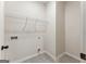 A functional laundry room providing ample space for appliances and storage solutions for efficient organization at 527 Bohannon Rd # 12, Grantville, GA 30220