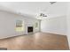 Spacious living room boasts hardwood floors and a cozy fireplace, perfect for gatherings or quiet evenings at 527 Bohannon Rd # 12, Grantville, GA 30220