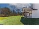 Expansive backyard featuring a well-manicured lawn and a charming covered patio perfect for outdoor entertaining at 515 Bohannon Rd # 13, Grantville, GA 30220