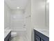 This modern bathroom features a vanity and a bathtub at 515 Bohannon Rd # 13, Grantville, GA 30220