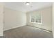 Bright bedroom featuring neutral walls and soft carpeting at 515 Bohannon Rd # 13, Grantville, GA 30220