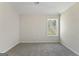 Bright bedroom features neutral walls and soft carpeting at 515 Bohannon Rd # 13, Grantville, GA 30220