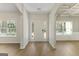 Bright foyer with hardwood floors, decorative trim, and views into adjacent living spaces at 515 Bohannon Rd # 13, Grantville, GA 30220