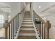 Staircase with wood treads and black metal railing at 515 Bohannon Rd # 13, Grantville, GA 30220