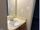 Clean bathroom with single sink vanity and mirrored medicine cabinet at 2570 Picardy N Cir # B, Atlanta, GA 30349