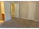 Bedroom with carpet, two closets and access to bathroom at 2570 Picardy N Cir # B, Atlanta, GA 30349