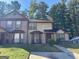 Two-story townhouse with a landscaped yard and a charming exterior at 2570 Picardy N Cir # B, Atlanta, GA 30349