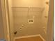 Laundry room with wire shelving and space for washer and dryer at 2570 Picardy N Cir # B, Atlanta, GA 30349