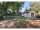 Backyard with detached garage and mature trees at 166 Chappell Nw Rd, Atlanta, GA 30314