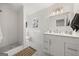 Modern bathroom with white vanity and patterned floor at 166 Chappell Nw Rd, Atlanta, GA 30314