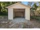 Detached single-car garage with gravel floor at 166 Chappell Nw Rd, Atlanta, GA 30314