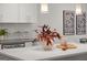 White kitchen island with quartz countertop and modern decor at 166 Chappell Nw Rd, Atlanta, GA 30314