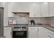 Stainless steel stove and range in a newly remodeled kitchen at 166 Chappell Nw Rd, Atlanta, GA 30314