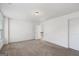 Simple bedroom with neutral walls and wall-to-wall carpeting at 1006 Ensign Peak Ct, Lawrenceville, GA 30044