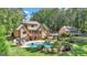 Aerial view of house, pool, detached garage and expansive backyard at 140 Haddock Pt, Brooks, GA 30205