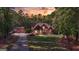 House with a large backyard and driveway at 140 Haddock Pt, Brooks, GA 30205