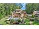 Aerial view of home showcasing pool, landscaping, and large backyard at 140 Haddock Pt, Brooks, GA 30205
