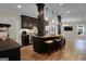 Basement kitchenette with granite counters and dark cabinetry at 140 Haddock Pt, Brooks, GA 30205