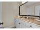 Modern bathroom vanity with granite countertop and light-colored cabinets at 140 Haddock Pt, Brooks, GA 30205