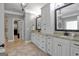 Elegant bathroom with double vanity and walk-in shower at 140 Haddock Pt, Brooks, GA 30205