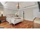 Bright bedroom with hardwood floors and en-suite bath access at 140 Haddock Pt, Brooks, GA 30205