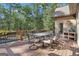 Deck features a dining area and grill, overlooking the pool at 140 Haddock Pt, Brooks, GA 30205