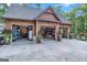 Three-car garage with built-in shelving at 140 Haddock Pt, Brooks, GA 30205