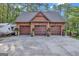 Three-car garage with extra storage space at 140 Haddock Pt, Brooks, GA 30205
