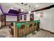 Home theater bar with seating for guests at 140 Haddock Pt, Brooks, GA 30205