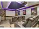 Home theater with reclining seats and ambient lighting at 140 Haddock Pt, Brooks, GA 30205