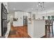 Modern kitchen with white cabinets, stainless steel appliances, and granite countertops at 140 Haddock Pt, Brooks, GA 30205