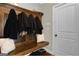 Inviting mudroom with built-in bench and storage at 140 Haddock Pt, Brooks, GA 30205