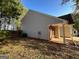 Backyard with lots of trees and a grassy area at 516 Jaclyn Cir, Mcdonough, GA 30253