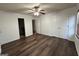 Bedroom with hardwood flooring, ceiling fan and double door closet at 516 Jaclyn Cir, Mcdonough, GA 30253