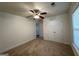 Bedroom with carpet, ceiling fan, closet and window with blinds at 516 Jaclyn Cir, Mcdonough, GA 30253
