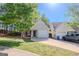 House with a yard and a driveway at 516 Jaclyn Cir, Mcdonough, GA 30253
