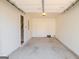 Spacious garage with concrete floor and room for storage at 516 Jaclyn Cir, Mcdonough, GA 30253