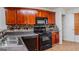 Bright kitchen features modern appliances, granite countertops, and sleek cabinetry at 516 Jaclyn Cir, Mcdonough, GA 30253