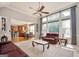 Spacious living room with hardwood floors and large windows at 185 Fieldstone Way, Fayetteville, GA 30215