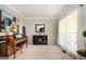 Bright living room with a piano and large windows at 185 Fieldstone Way, Fayetteville, GA 30215