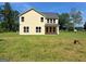 Expansive backyard offers plenty of room for outdoor activities and entertaining at 200 Parker Dr, Mcdonough, GA 30253