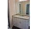 A bathroom with double sink vanity and a granite countertop at 200 Parker Dr, Mcdonough, GA 30253