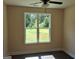 This bedroom offers great natural light through a double window with beautiful outdoor views at 200 Parker Dr, Mcdonough, GA 30253