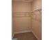 This walk in closet provides ample space to keep things organized with wire shelving at 200 Parker Dr, Mcdonough, GA 30253