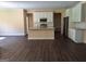 A kitchen with an island, stainless steel appliances, and modern countertops is pictured at 200 Parker Dr, Mcdonough, GA 30253