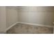 Walk-in closet with carpet and wire shelving system at 502 Hinton Farm Way, Dacula, GA 30019