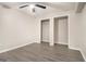 Basement bedroom with grey vinyl plank flooring and closet at 1241 Lambeth Se Way, Conyers, GA 30013