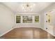 Spacious bedroom featuring hardwood floors and bay window at 1241 Lambeth Se Way, Conyers, GA 30013