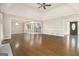 Open concept living room with hardwood floors and high ceilings at 1241 Lambeth Se Way, Conyers, GA 30013